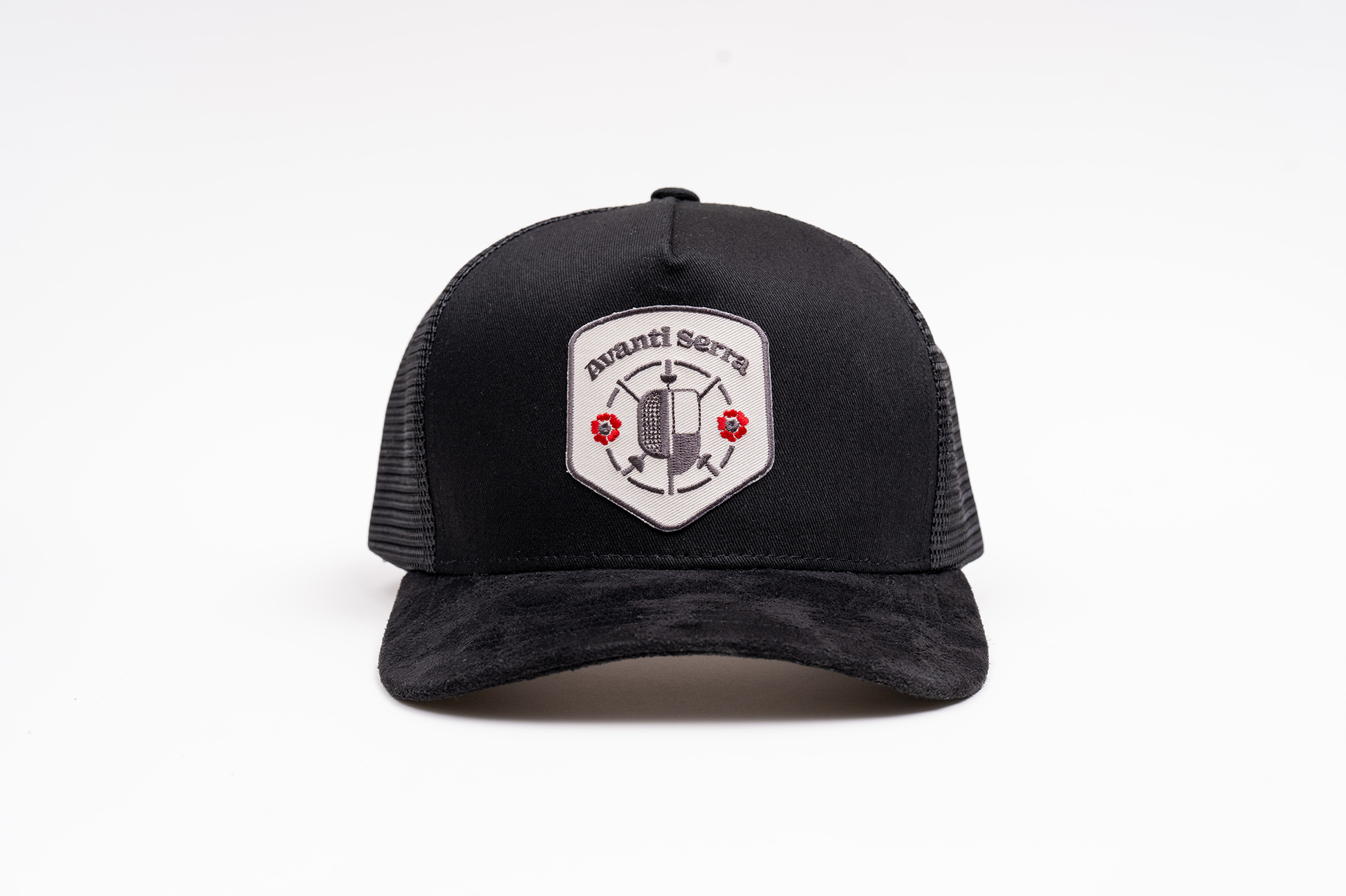 Black trucker hat with embroidered patches and suede brim